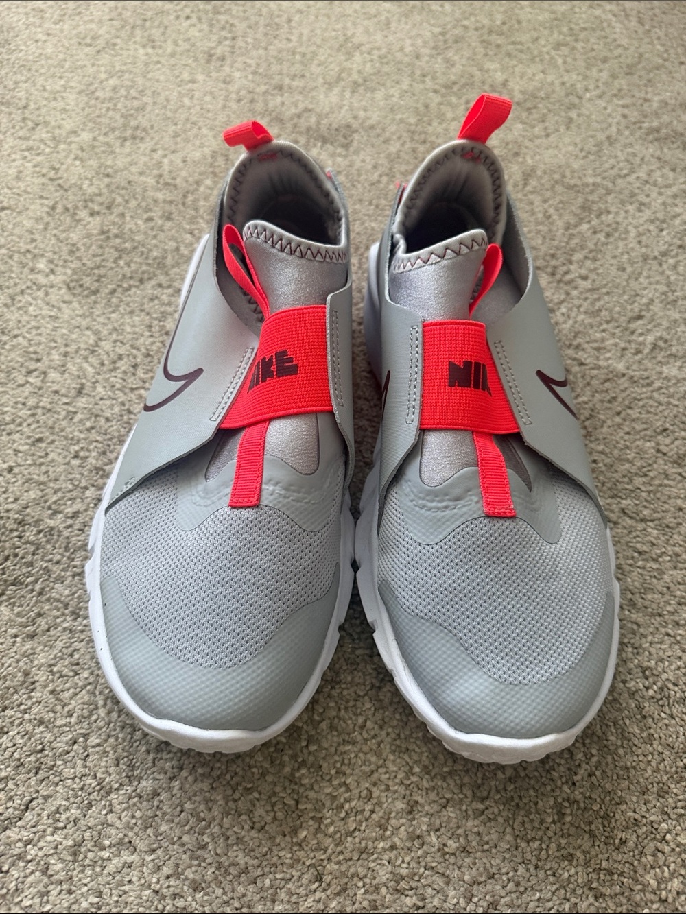 Nike Kids Grey Sneakers with Bright Red Accents